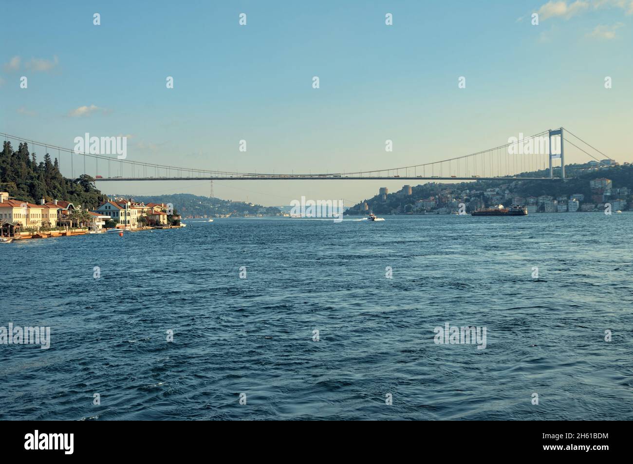 transport of Turkey in Istanbul, Bosphorus Strait or Bosporus with its suspension bridge the first to connect the two continents of Europe and Asia Stock Photo