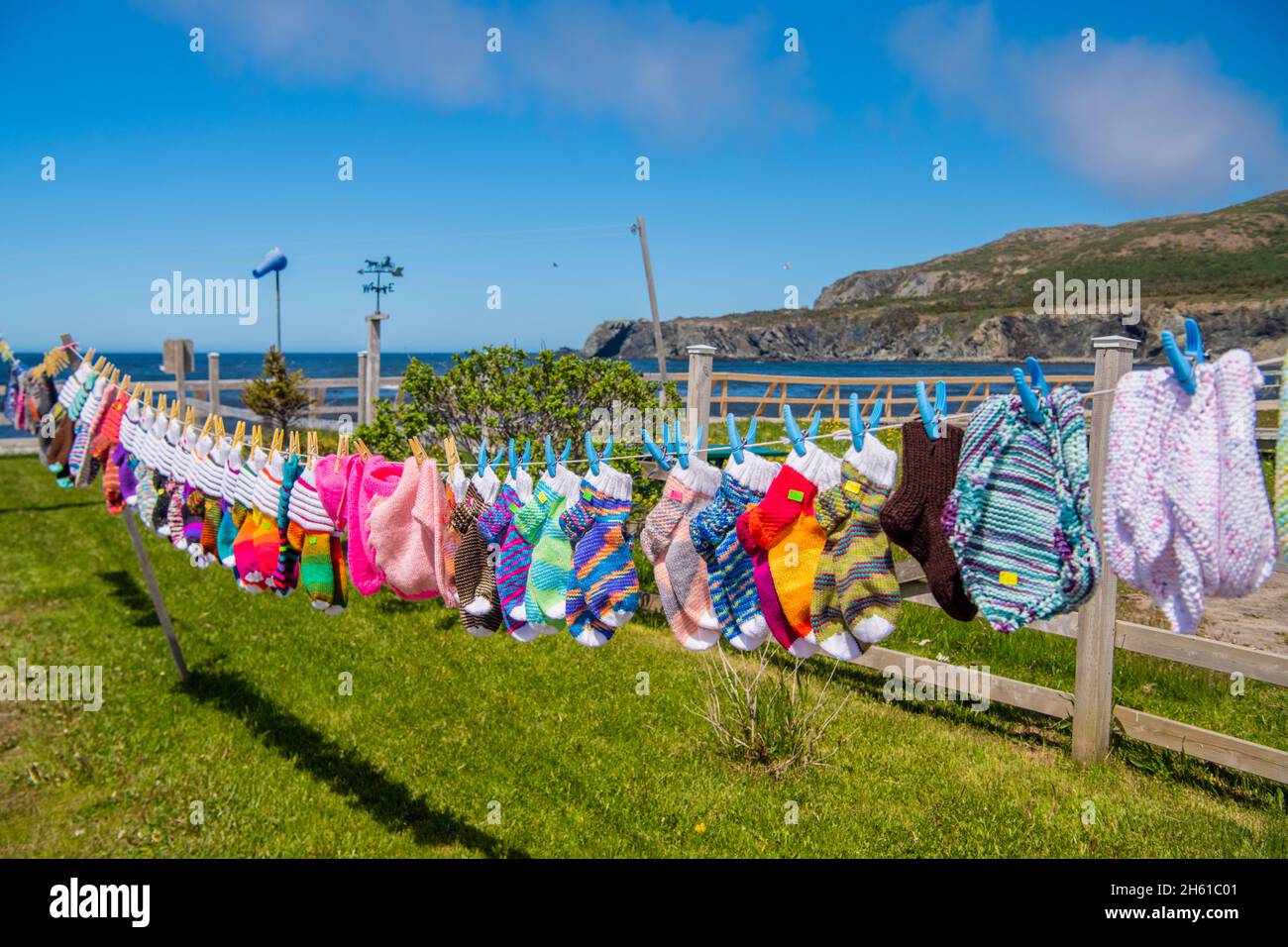 Knitted garments for sale- socks, mittens, hats, Trout River, Newfoundland and Labrador NL, Canada Stock Photo
