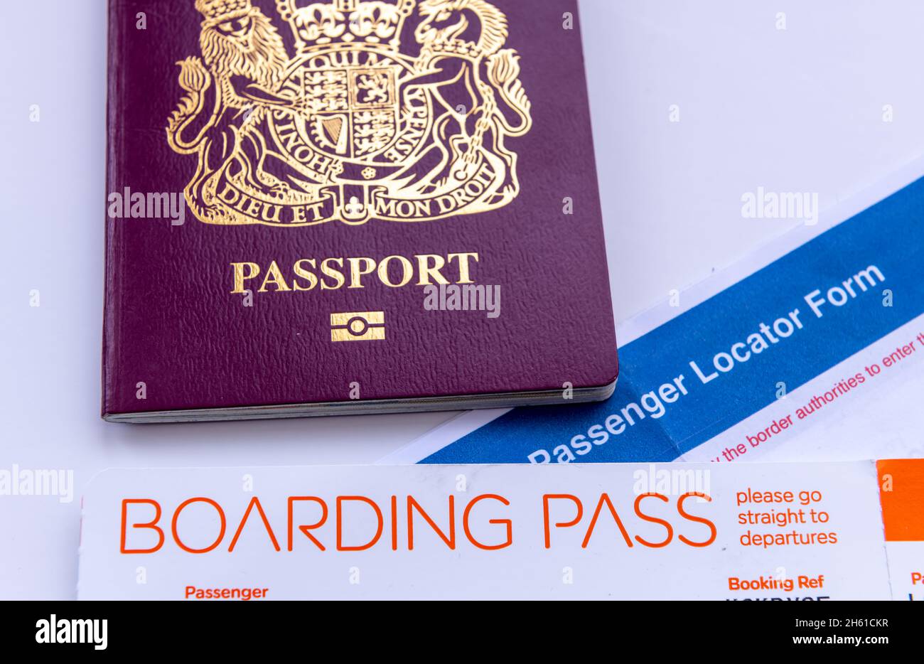 Passport, boarding pass, passenger locator form and Covid pass, the full set of documents required for international travel during Covid-19 pandemic. Stock Photo
