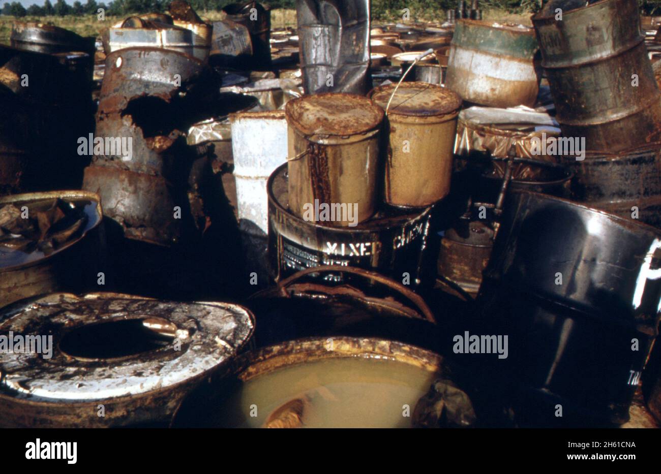 About 3,000 drums containing hazardous industrial wastes have been stored for six months in this