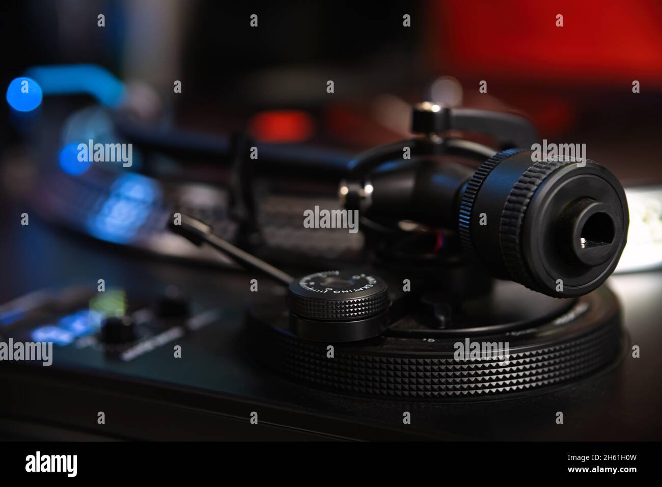 Turntables tone arm. Dj turn table player device in close up. Hi fi
