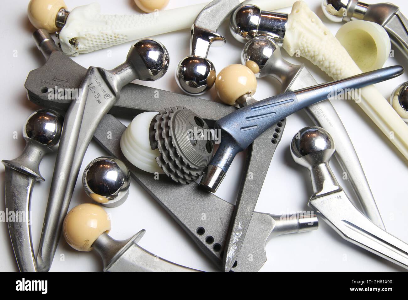 Viersen, Germany - June 9. 2021: Closeup of group different implant parts for orthopedic artificial hip joint replacement surgery Stock Photo