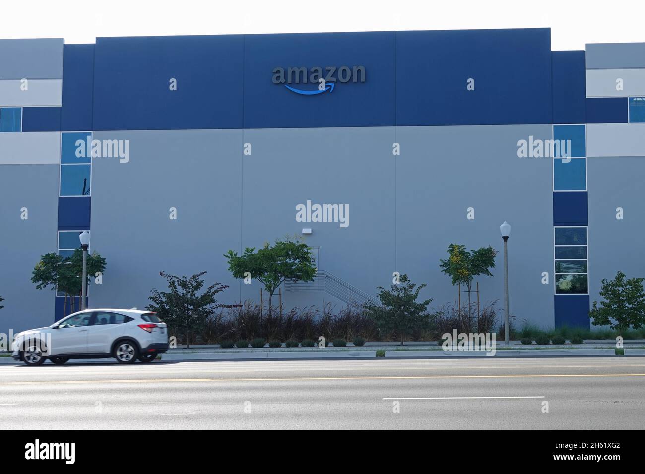 Burbank, CA / USA - Sept. 26, 2021: A newly-opened Amazon delivery center facility is shown adjacent to the Hollywood Burbank Airport during the day. Stock Photo