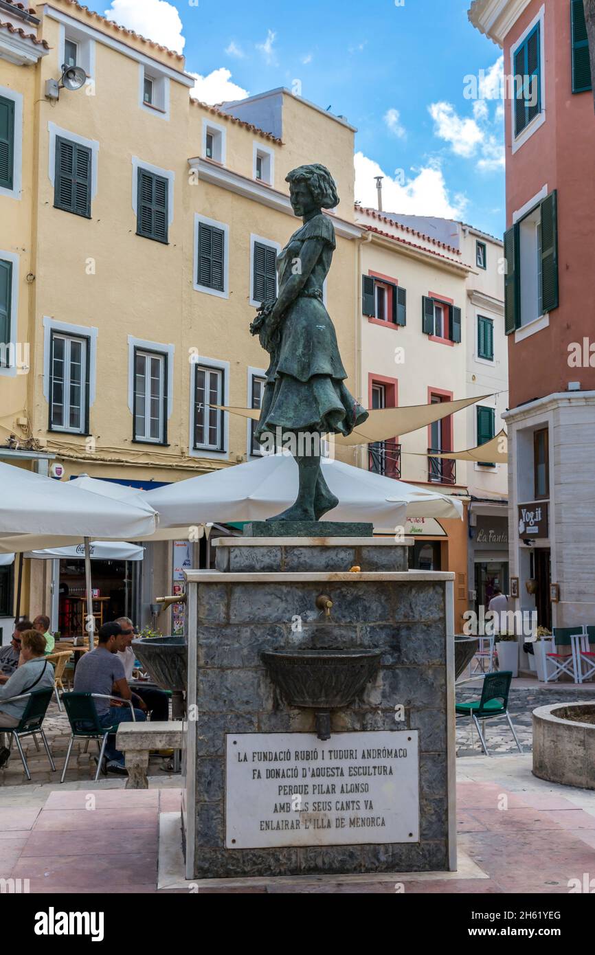 sculpture and tribute to singer pilar alonso,1897-1980,sculptor francesc vila,placa de colon,old town,mahon,mao,menorca,spain,europe Stock Photo
