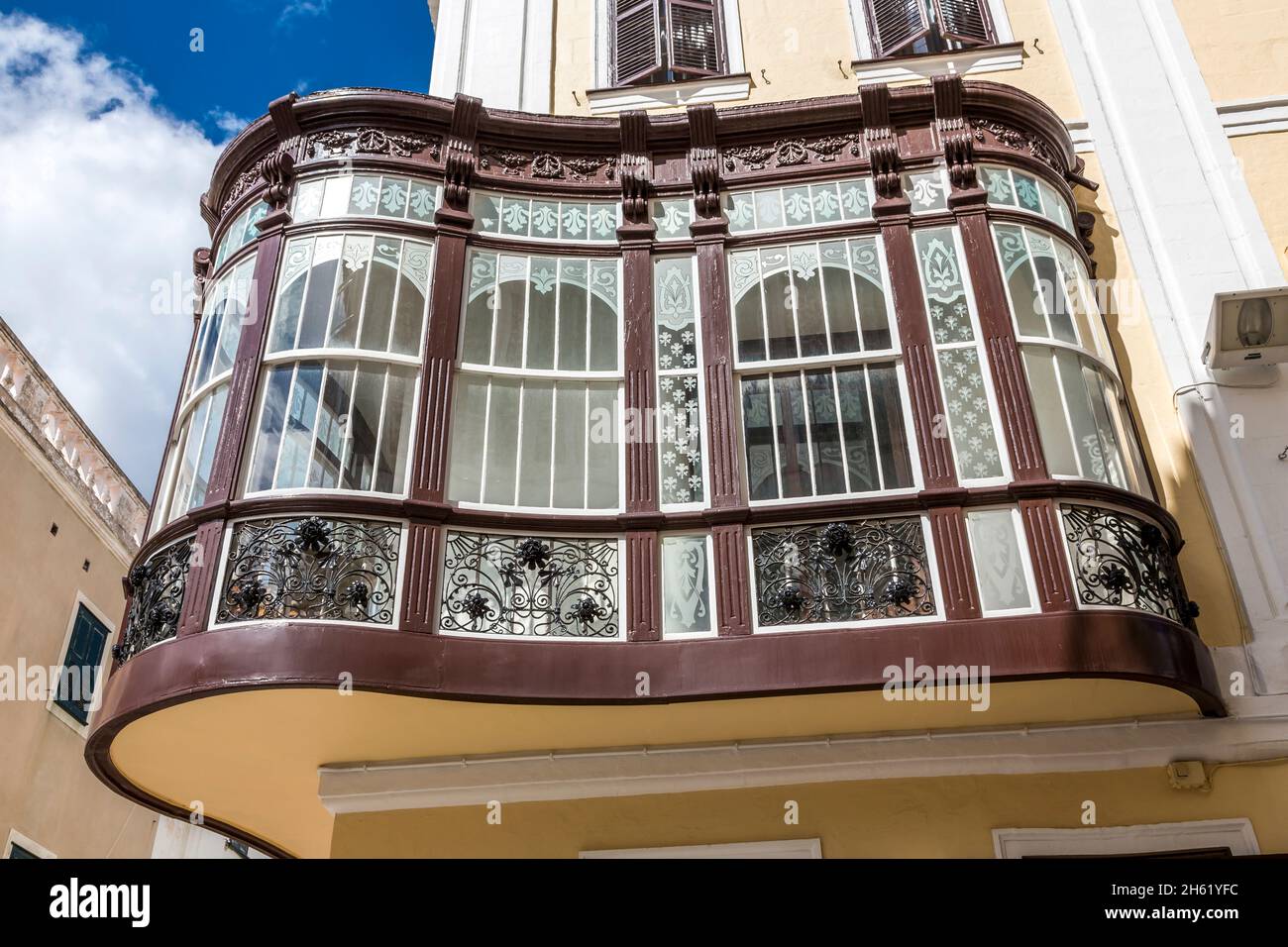 casa moncada with typical curved bay window,boinder,on carrer hannover,mahon,mao,menorca,spain,europe Stock Photo