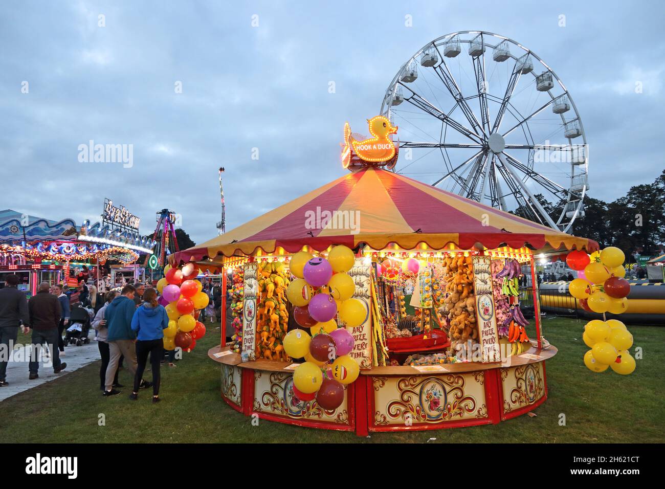 Hook a duck fairground stall Stock Photo Alamy