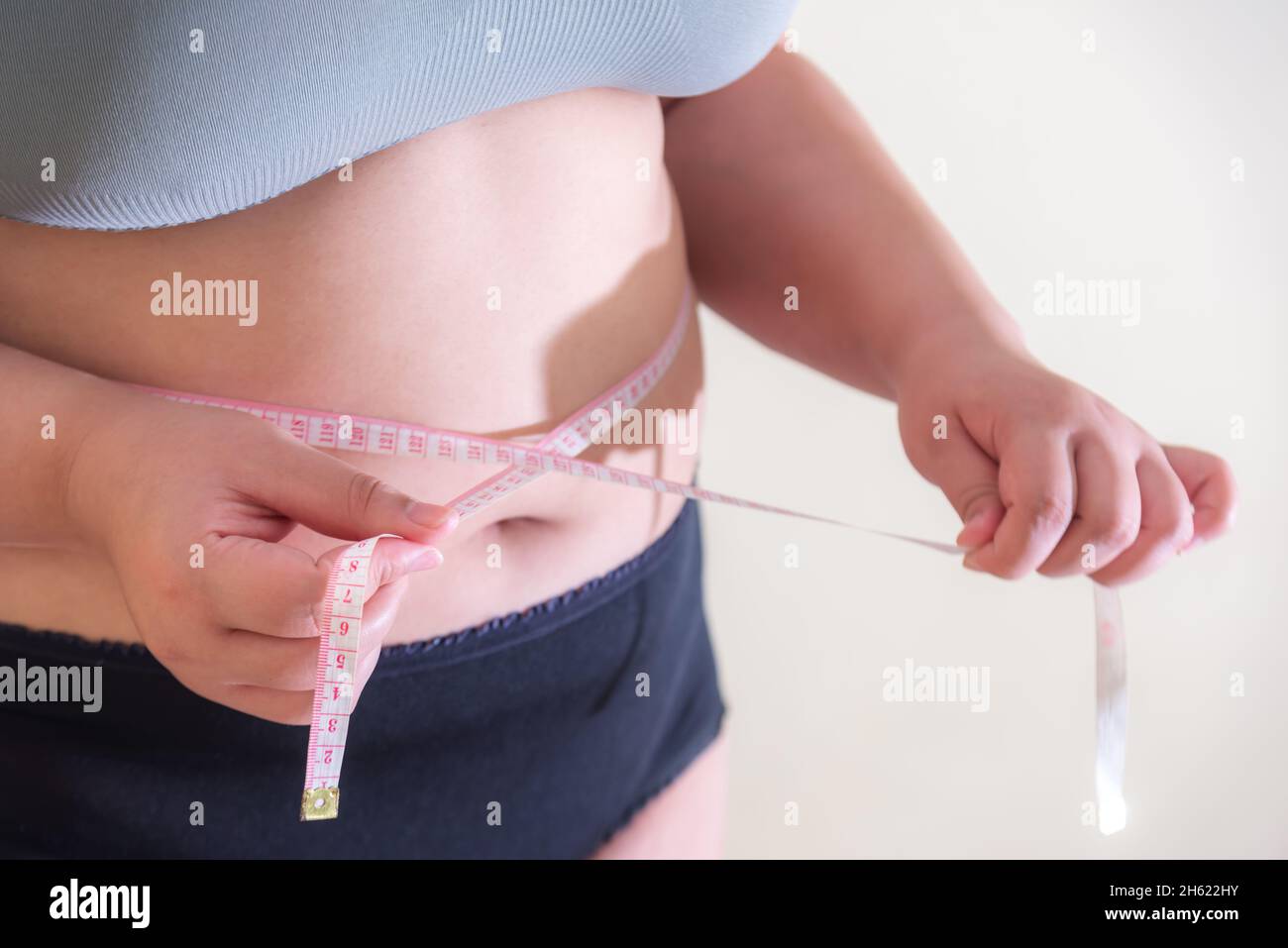Fat women., Belly women Overweight, Shape up healthy stomach muscle, and diet lifestyle, to reduce belly concept. Stock Photo