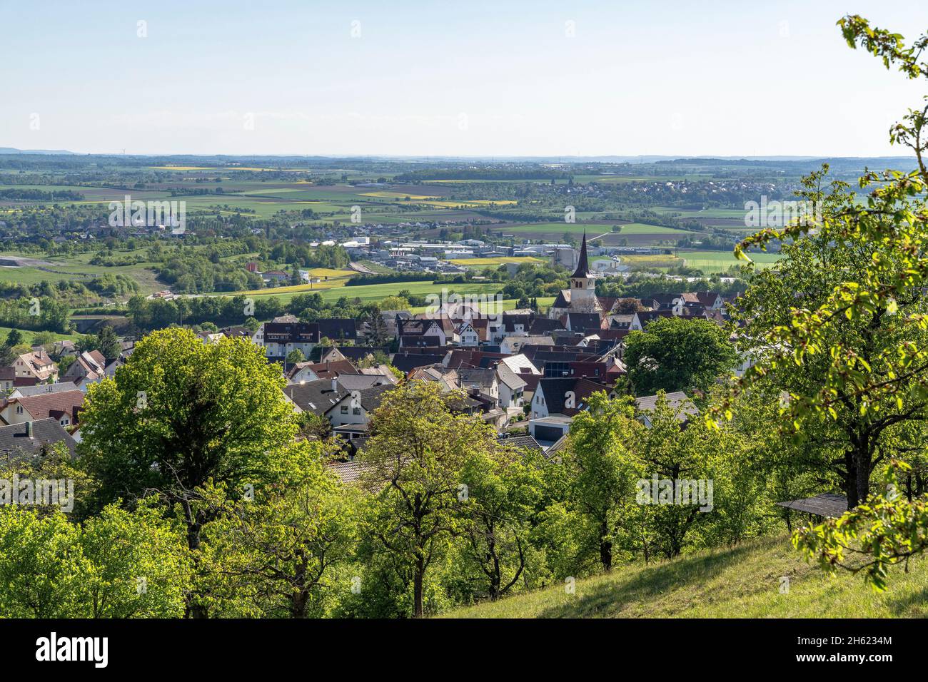 europe,germany,baden-wuerttemberg,schönbuch region,herrenberg,view from the orchards at schönbuchtrauf to the village of kayh and the ammertal Stock Photo
