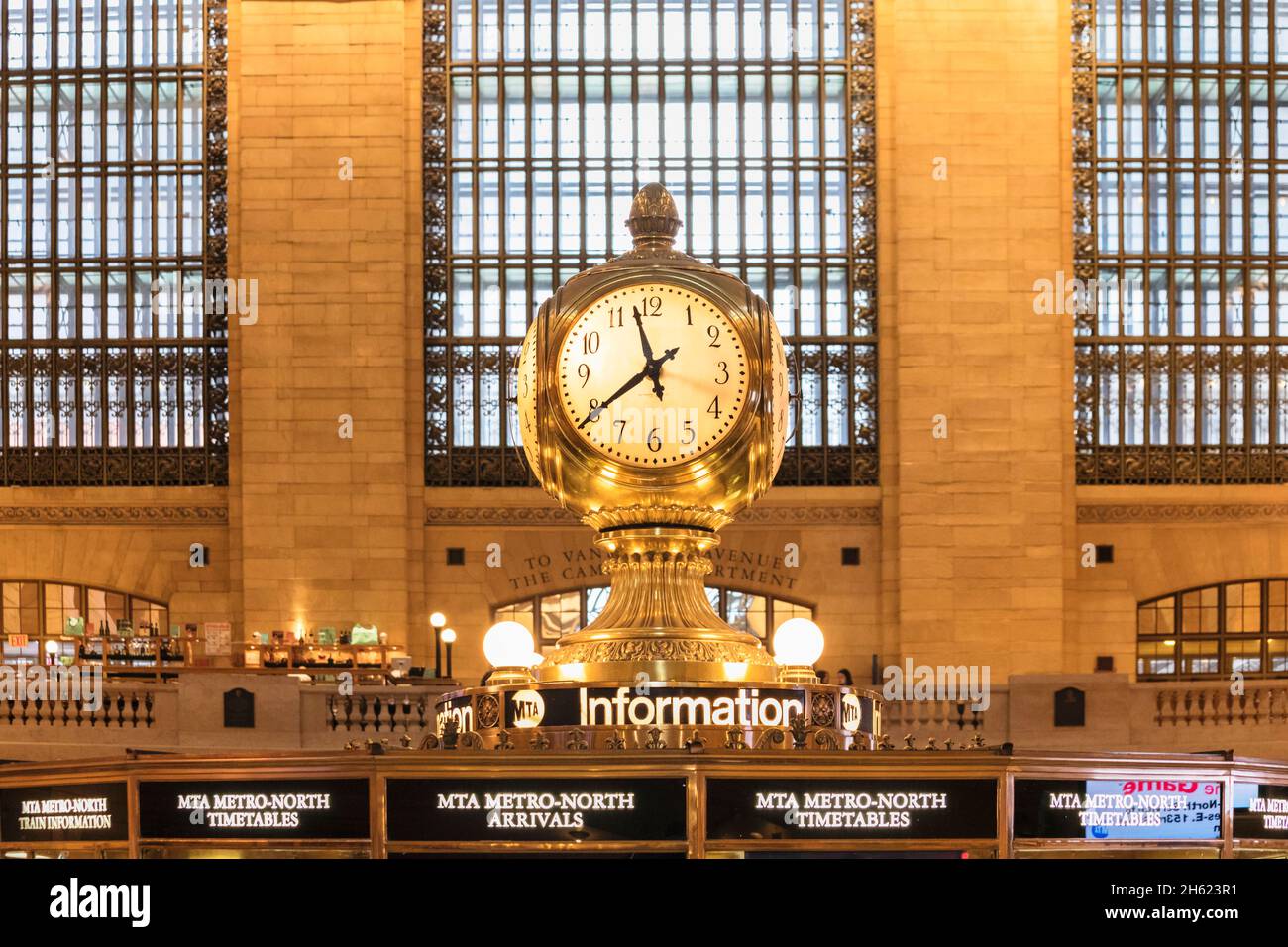 bronze clock above the information desk,grand central station concourse,manhattan,new york city,new york,usa Stock Photo