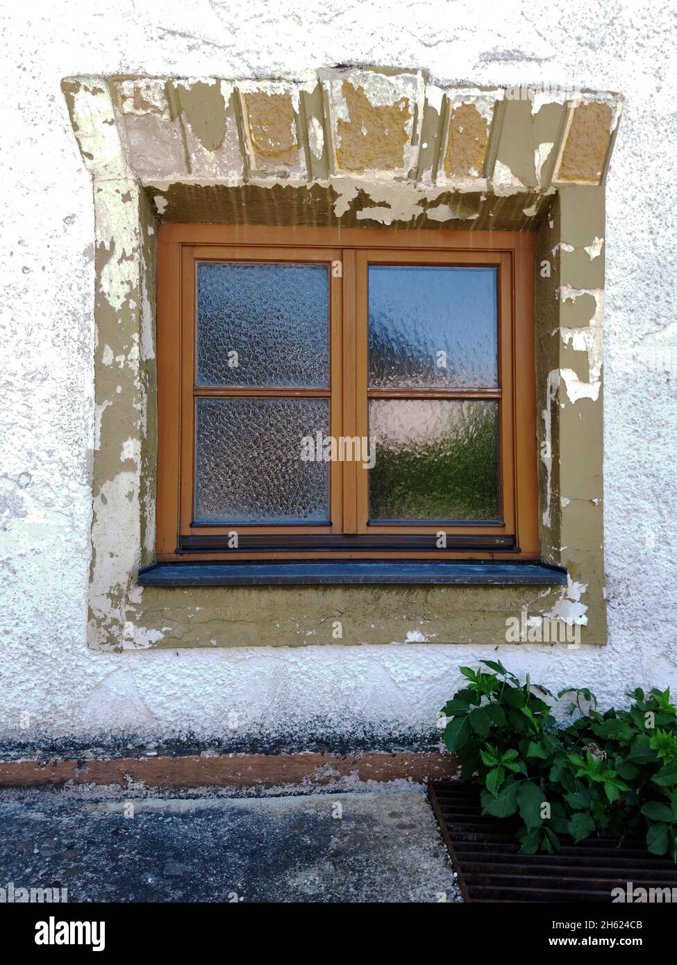 the inn 'zur blaue traube' in scharnitz,closed for years,is tending to urban decay Stock Photo