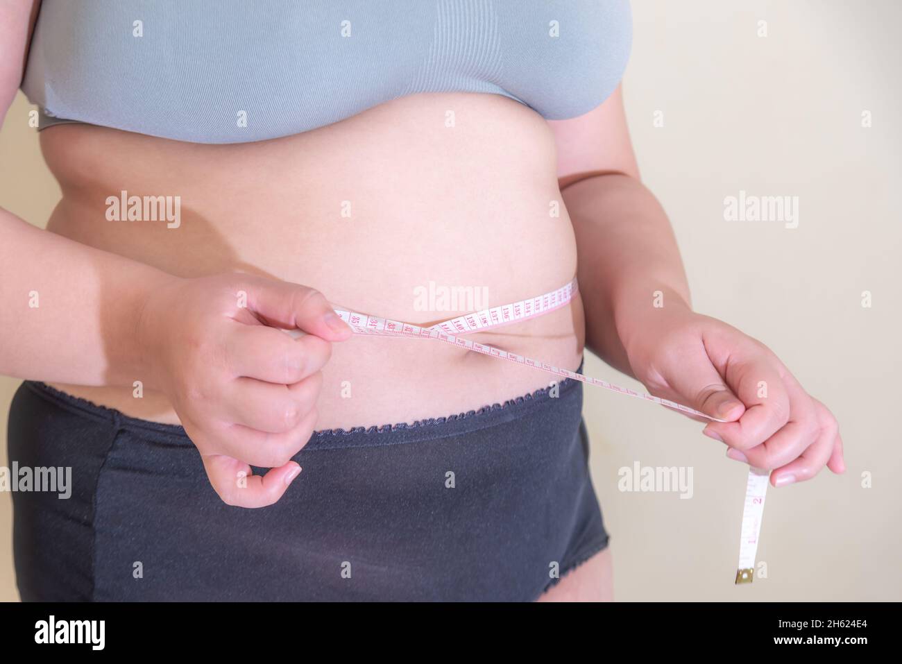 Fat women., Belly women Overweight, Shape up healthy stomach muscle, and diet lifestyle, to reduce belly concept. Stock Photo