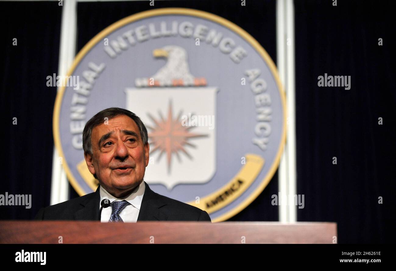 Secretary of Defense Leon Panetta talks to the staff of the CIA as he pays a final visit to the CIA headquarters in McLean, Va., on Feb. 14, 2013.  CIA Acting Director Michael J. Morell awarded Panetta the first Director's Distinguished Service Medal.  Before serving as defense secretary, Panetta was the CIA director, overseeing the raid that led to Osama bin Laden’s death. Stock Photo