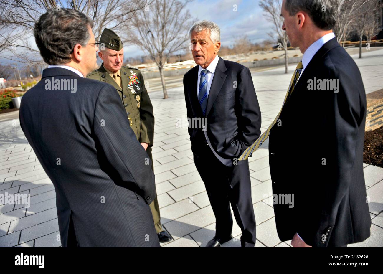Newly sworn in 24th Secretary of Defense Chuck Hagel is given a tour of the Pentagon 9-11 Memorial by Michael L. Rhodes, left, along with SMA Lt. Gen. Thomas Waldhauser and Marcel Lettre Feb. 27, 2013. Stock Photo