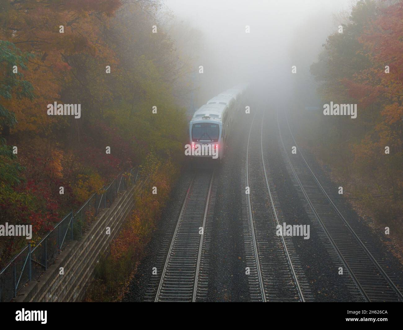 canada,ontario,daily schedule,mass transit,morning fog,urban commuter train, Stock Photo