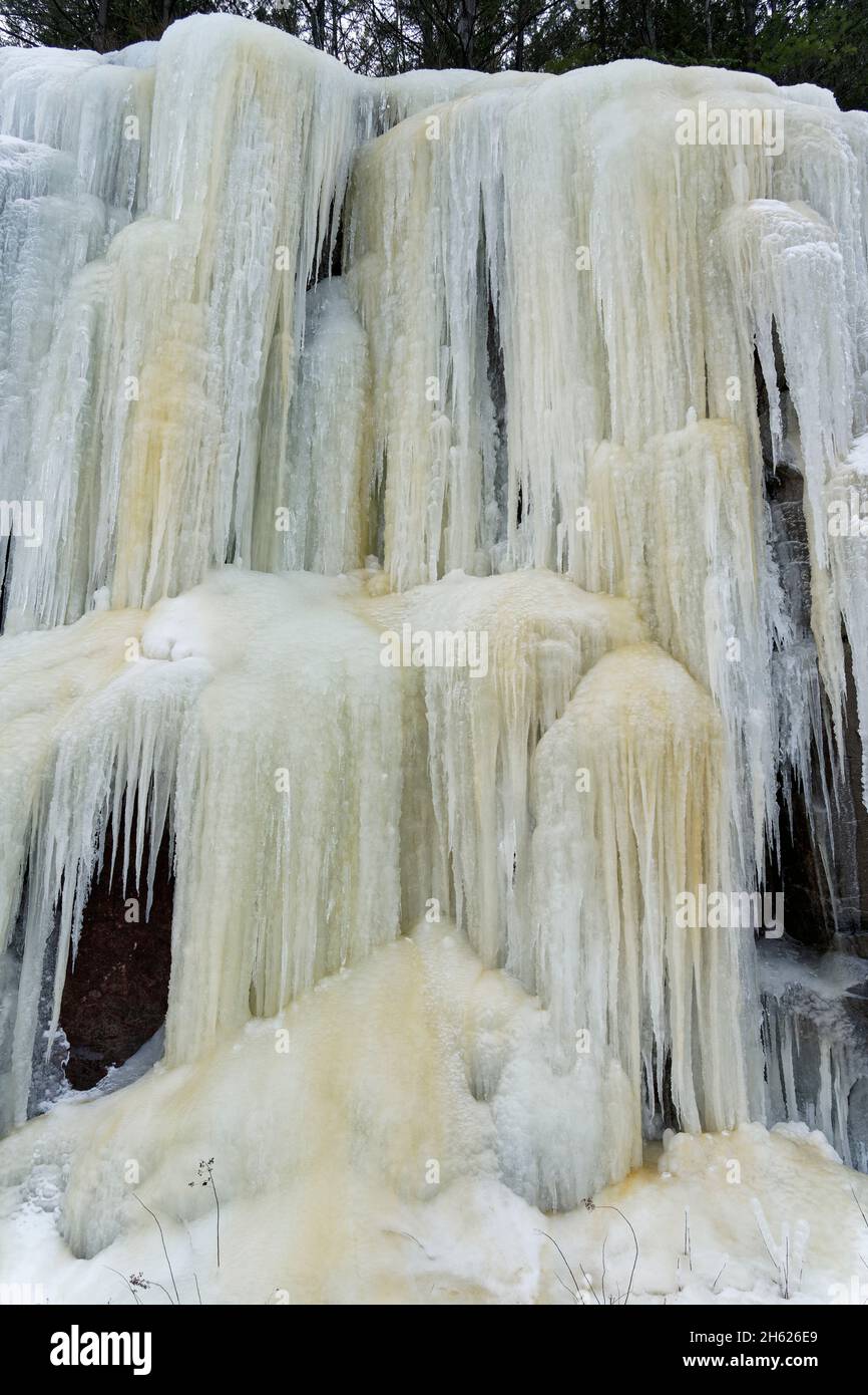 canada,southern ontario,bon echo provincial park,frozen waterfall,ice,iron oxide mineral stains, Stock Photo