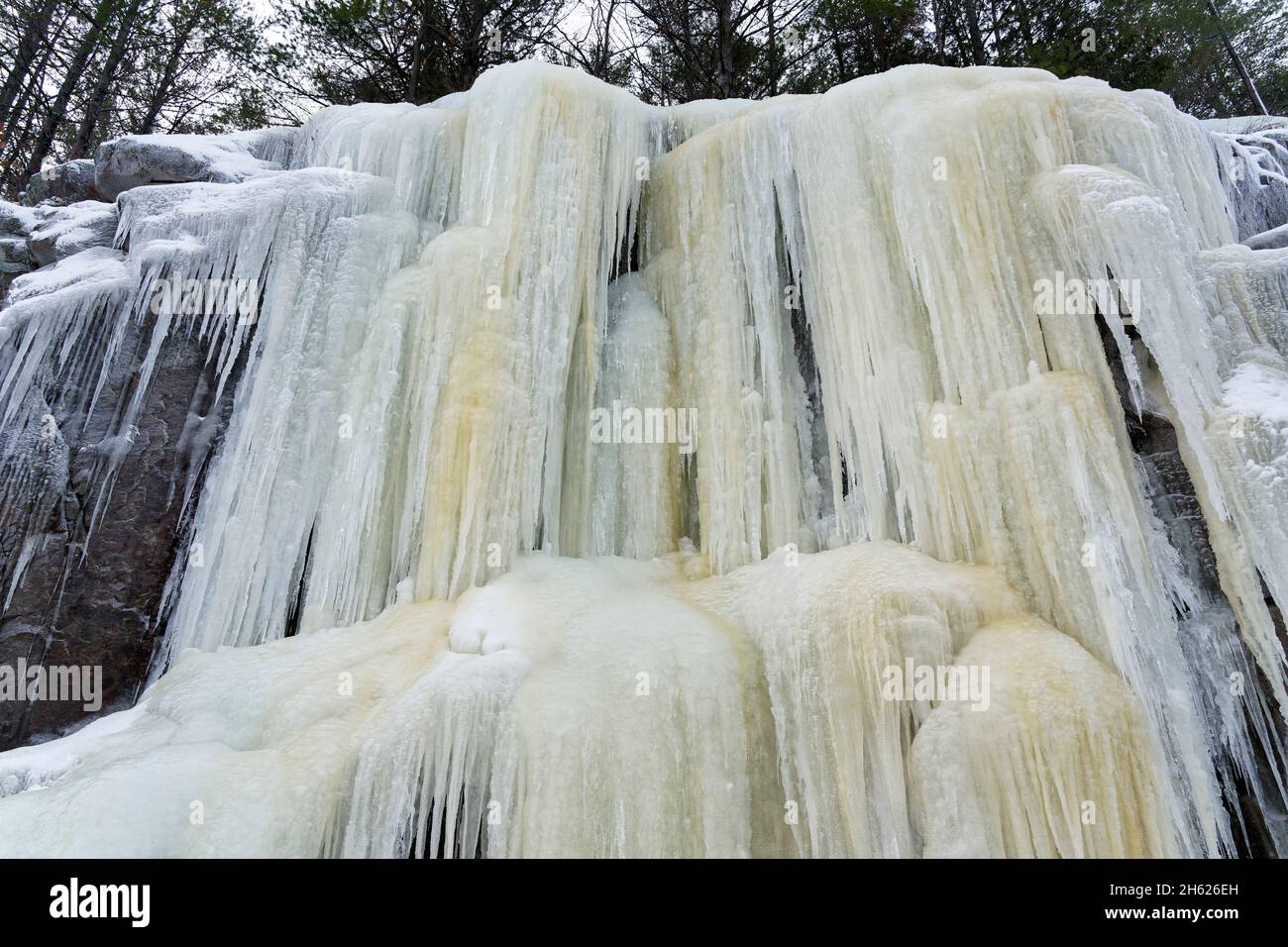 canada,southern ontario,bon echo provincial park,frozen waterfall,ice,iron oxide mineral stains, Stock Photo
