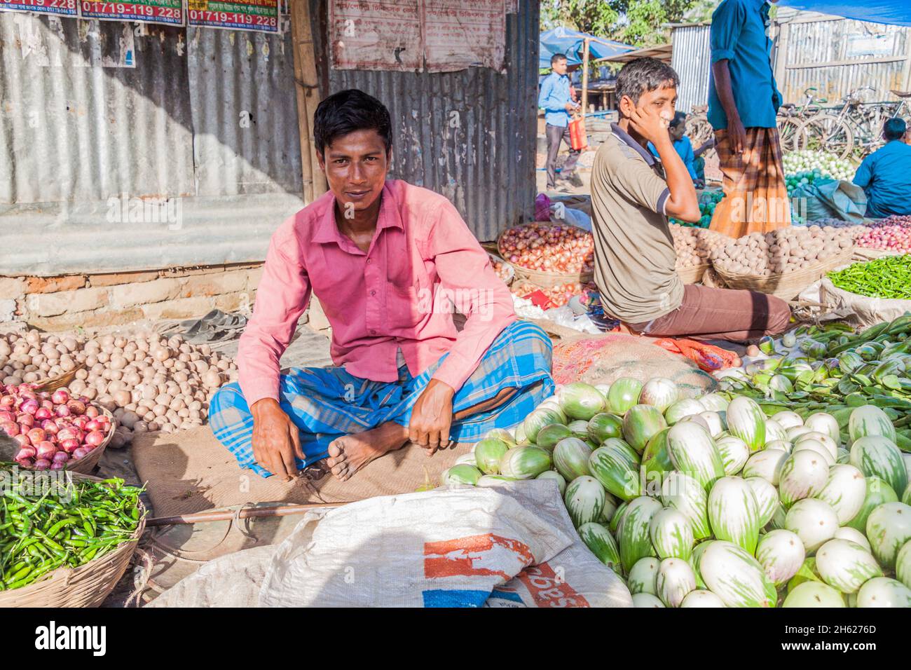 PAHARPUR, BANGLADESH NOVEMBER 6, 2016 Vegetable sellers at the local