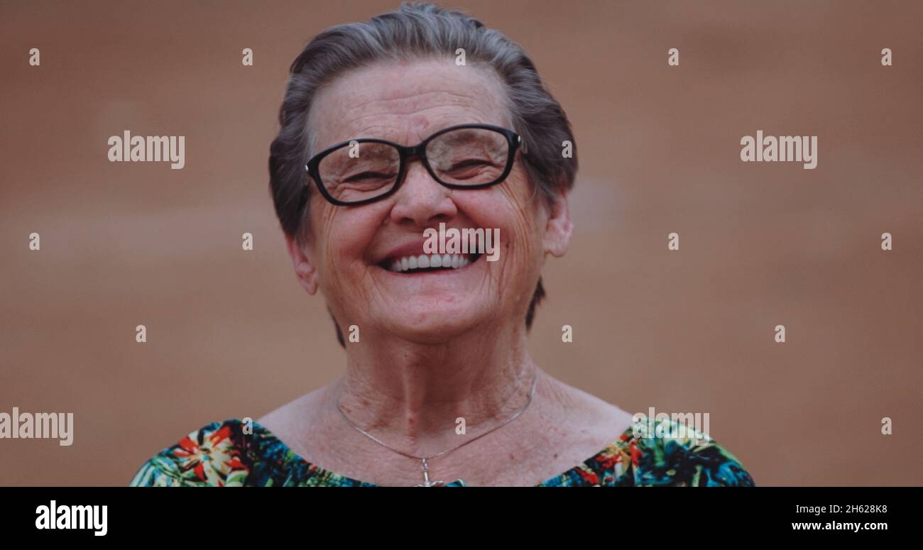 Latin woman smiling in outdoor hi-res stock photography and images - Alamy
