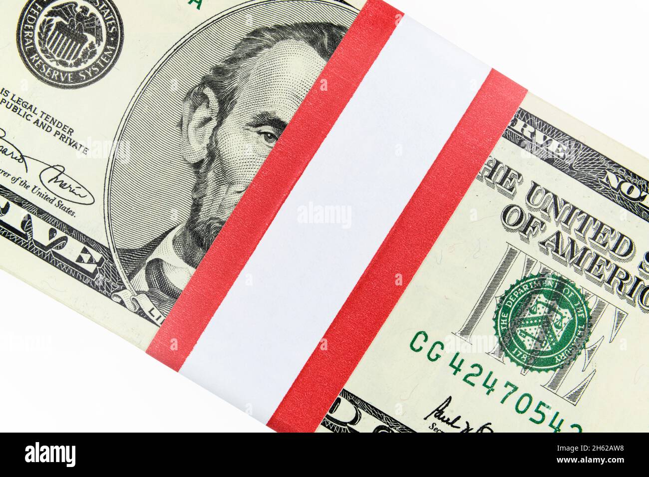 Close up of blank currency strap with five dollar money bundle. Stock Photo