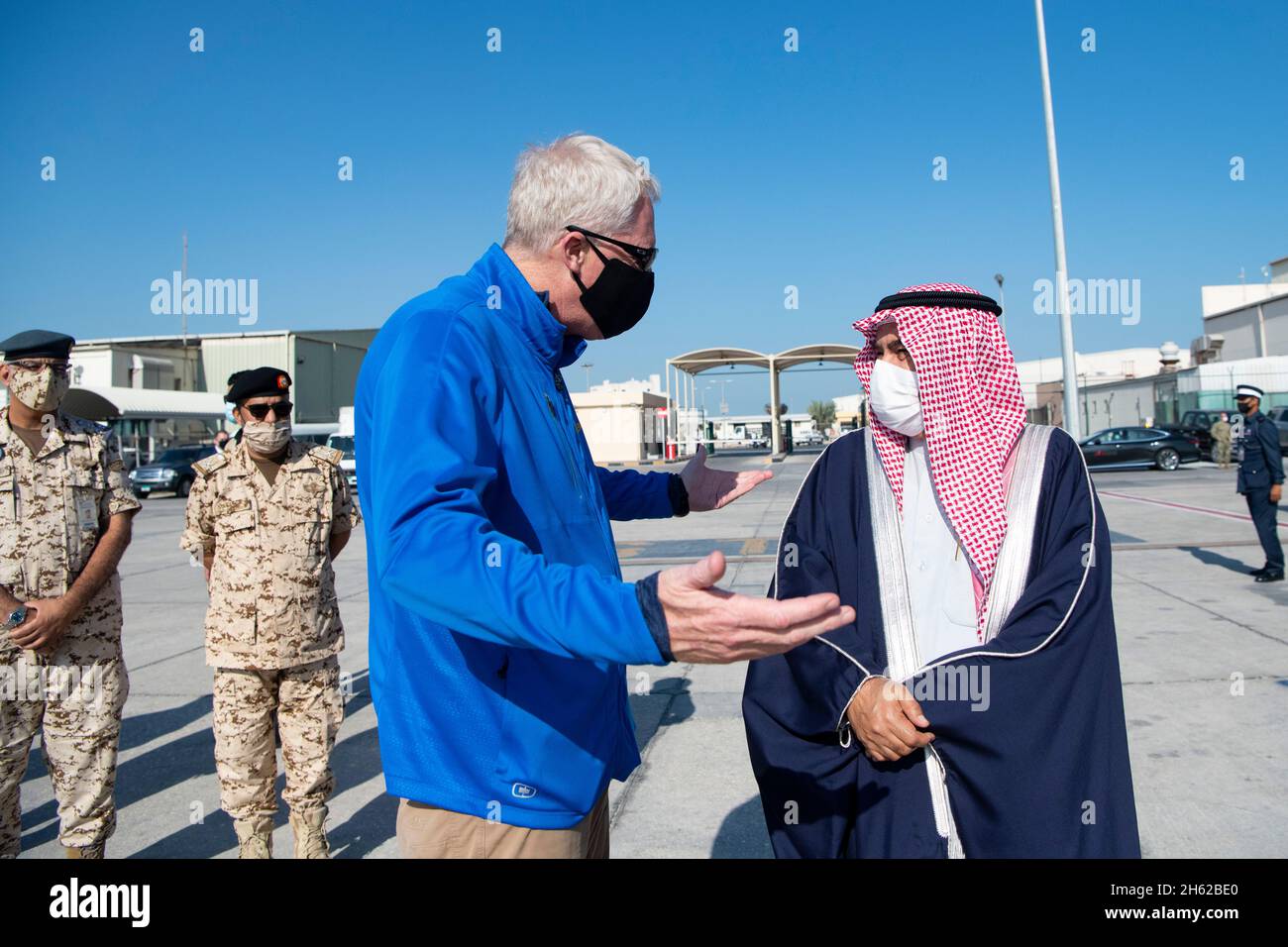 Reportage:  Acting Defense Secretary Christopher C. Miller talks with Bahrainâ€™s Minister of Defense Affairs Lt. Gen. Abdulla Al Nuaimi, upon arrival in Manama, Bahrain, Nov. 25, 2020. Stock Photo