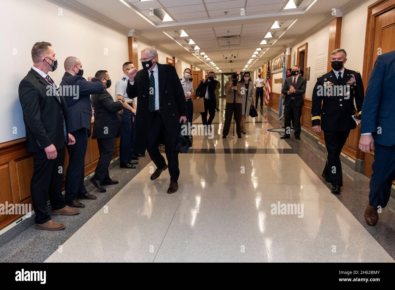 Reportage:  Outgoing Acting Defense Secretary Chris Miller greets staff as he departs the Pentagon during the administration transition, the Pentagon, Washington, D.C., Jan. 20, 2021. Stock Photo