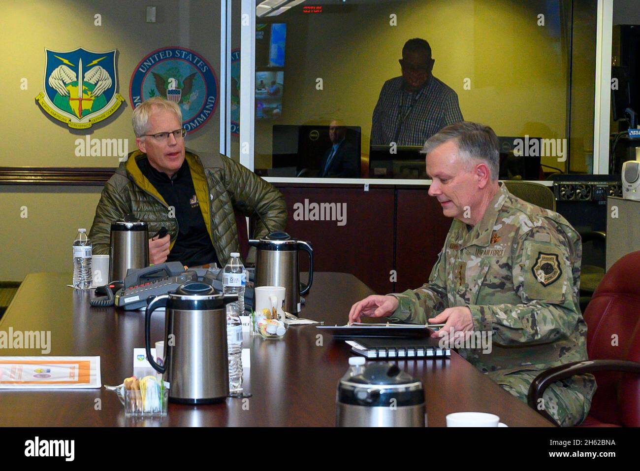 Reportage:  Acting Defense Secretary Chris Miller meets with the commander of North American Aerospace Defense Command and United States Northern Command, Air Force Gen. Glen VanHerck, at NORAD-USNORTHCOM headquarters, Peterson Air Force Base, Colo., Jan. 14, 2021. Stock Photo