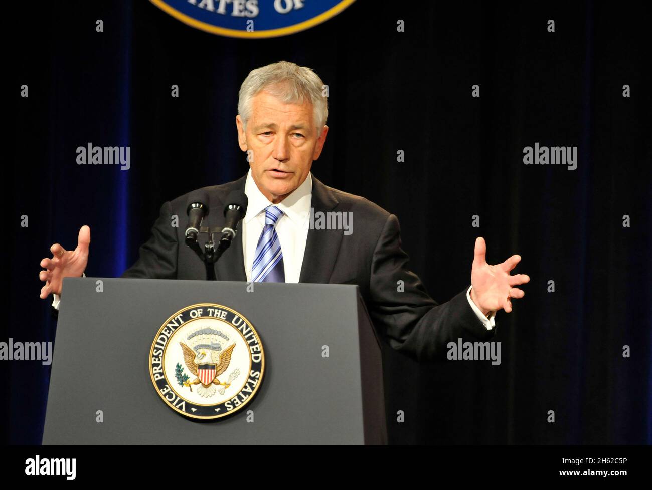 Secretary of Defense Chuck Hagel addresses the audience after he was sworn in as 24th Secretary of Defense during a ceremony in the Pentagon Auditorium,  March 14, 2013. Stock Photo
