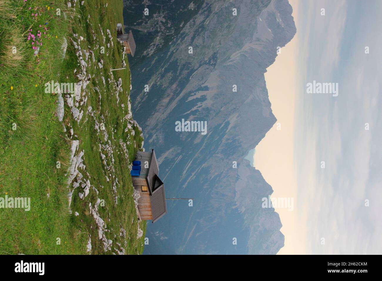 hike to the tiroler hütte (2153 meters) toilet house,behind it karwendeltal,view of hochkarspitze,eastern karwendelspitze,austria,tyrol,scharnitz,karwendel nature park, Stock Photo