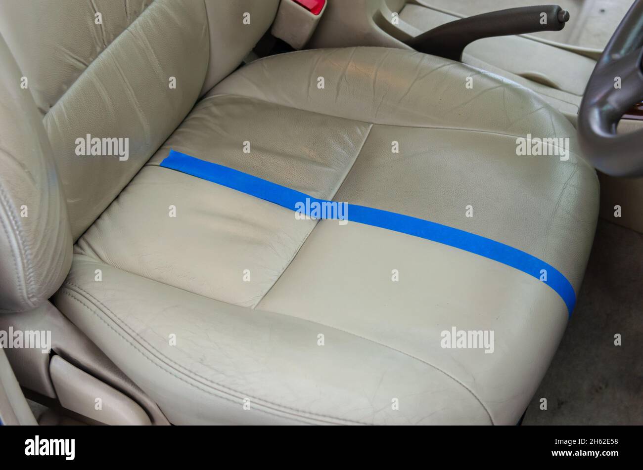 Before and after the leather seat cleaning service Stock Photo Alamy