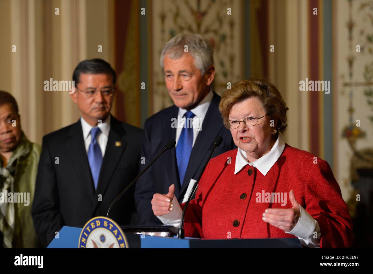 Senate Appropriations Committee Chairwoman Senator Barbara Milkulski, flanked by Secretary of Defense Chuck Hagel and Veterans Affairs Secretary Eric Shinseki, addresses the media ca. 2013 Stock Photo