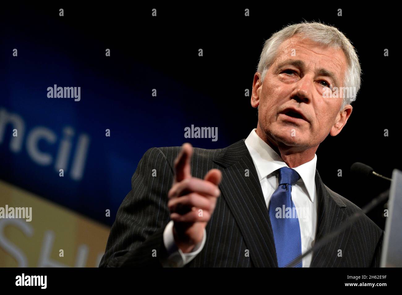 Secretary of Defense Chuck Hagel delivers remarks after being awarded the 2014 Distinguished International Leadership Award April 30, 2014. Stock Photo