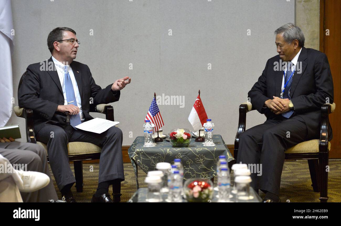 Deputy Secretary of Defense Ashton Carter participates in a bilateral meeting with Singaporean Minister of Defense Ng Eng Han as he attends the Jakarta International Defense Dialogue in Jakarta, Indonesia, March 20, 2013. Stock Photo