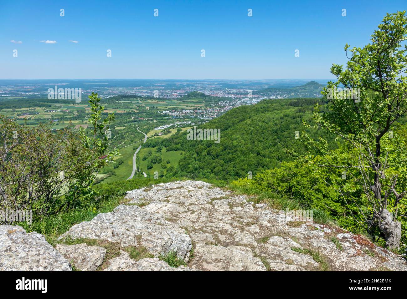 the wackerstein lookout point is designated as a geotope. the rock group is 80 meters long and 25 meters high. it consists of the mass limestone of the white jurassic delta and epsilon. the wackerstein is one of only two rocks in the reutlinger alb that are suitable for climbing Stock Photo