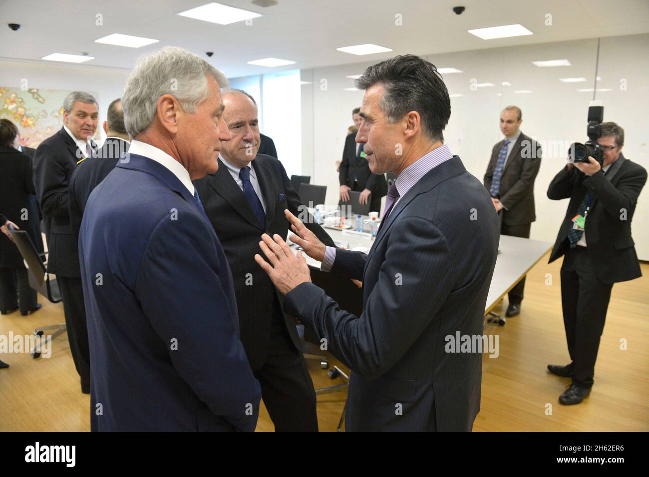 Secretary of Defense Chuck Hagel meets with NATO Secretary General, Anders Fogh Rasmussen as he attends the NATO Defense Ministerial meetings in Brussels, Belgium, Feb. 26, 2014. Stock Photo