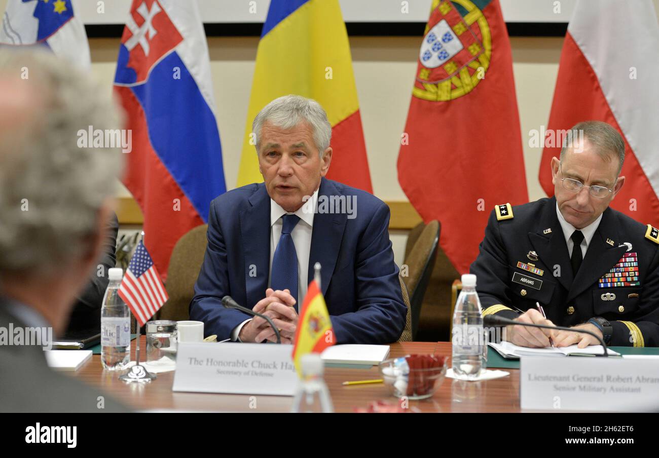 Secretary of Defense Chuck Hagel meets with Spain's Minister of Defense Pedro Morenés Eulate as he attends the NATO Defense Ministerial meetings Feb. 26, 2014 Stock Photo