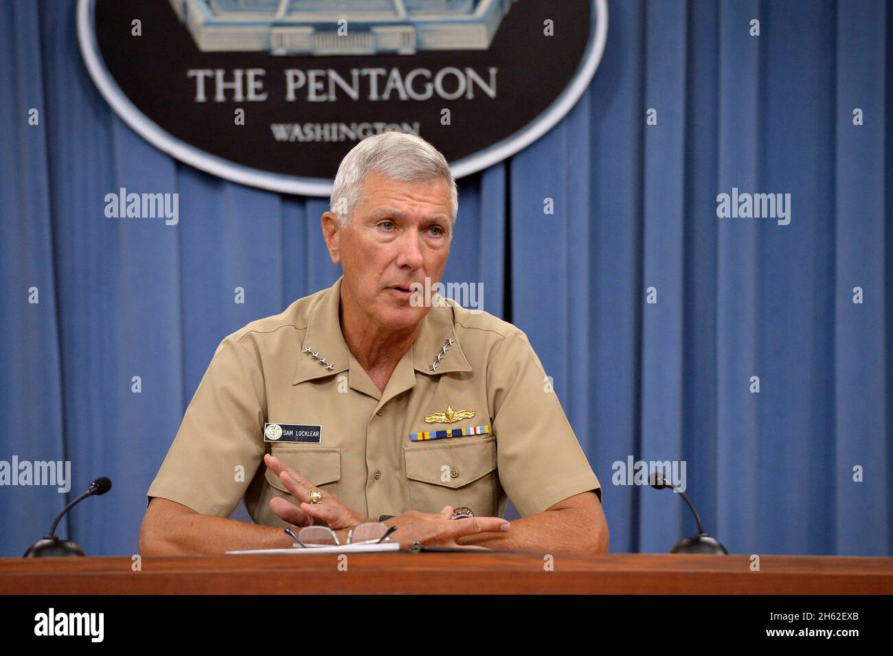 Admiral Samuel Locklear III, commander of the U.S. Pacific Command, answers questions from the press July 29, 2014. Stock Photo