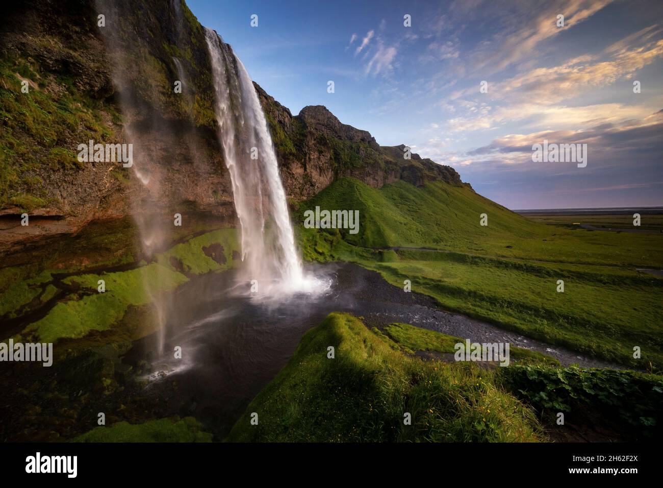 the enormous seljalandsfoss waterfall in the south of iceland. Stock Photo