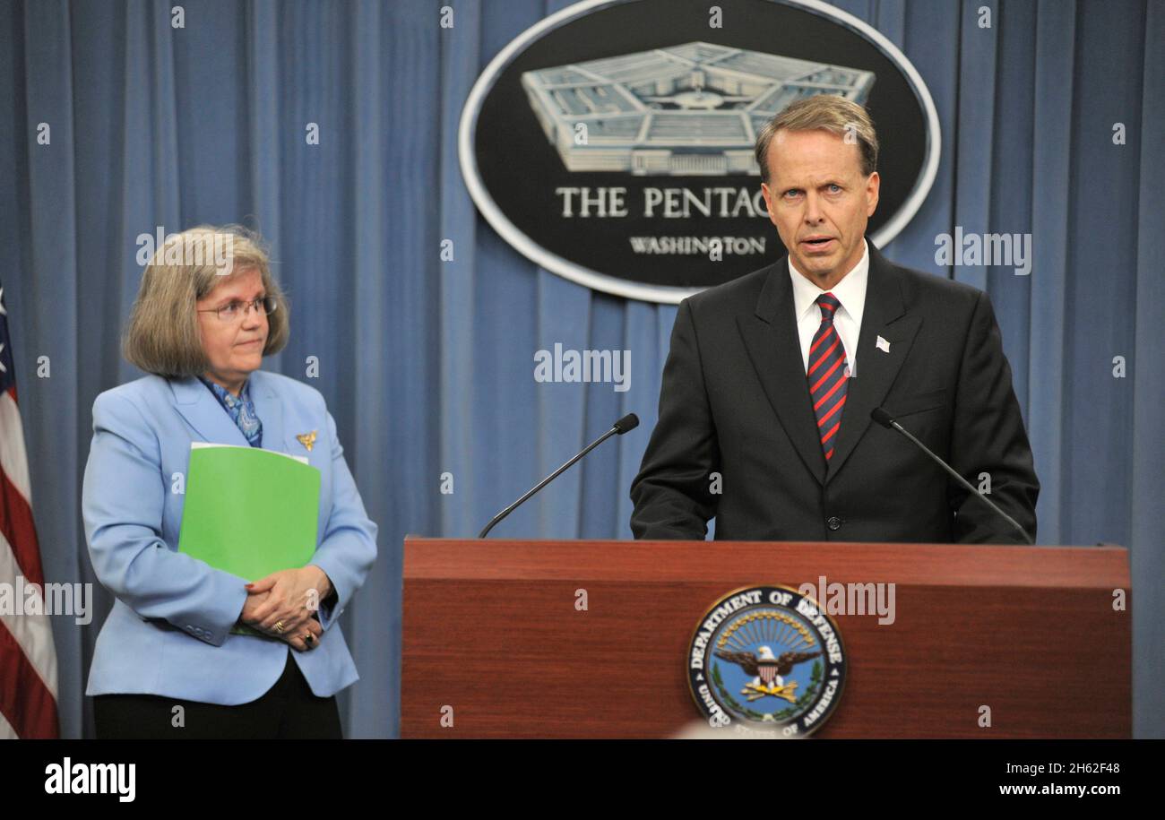 Acting Deputy Assistant Secretary for Military Community and Family Policy Charles Milam talks to reporters during a joint press conference with Holly Petraeus in the Pentagon on Oct. 18, 2012. Stock Photo