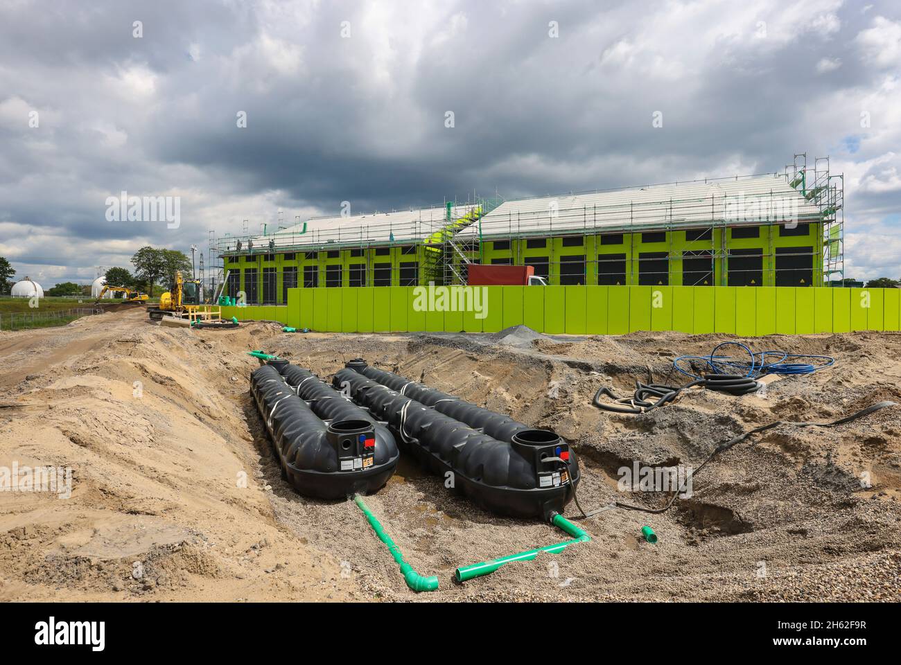 oberhausen,north rhine-westphalia,germany - emscher conversion,new construction of the emscher ake sewer,here the new pumping station in oberhausen,2 rainwater cisterns collect together 50,000 liters of rainwater,the newly created gardens are then watered via a well system. Stock Photo