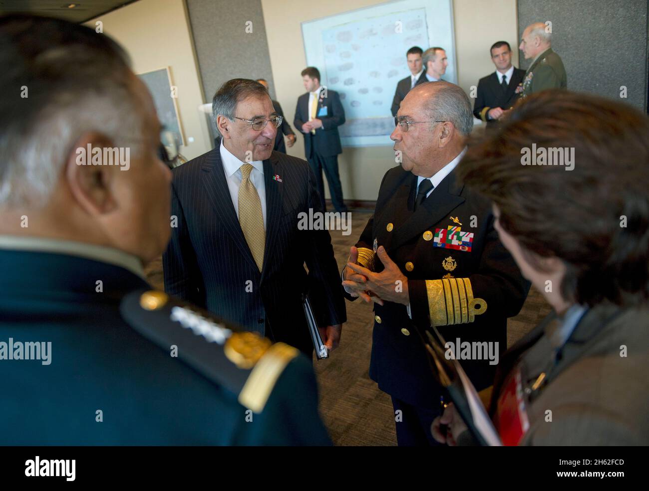 Secretary of Defense Leon Panetta converses with Mexican Secretary of National Defense Gen. Guillermo Galvan shortly before beginning trilateral meetings with Defense ministers from Canada and Mexico in Ottawa, Canada, on March 27, 2012 Stock Photo