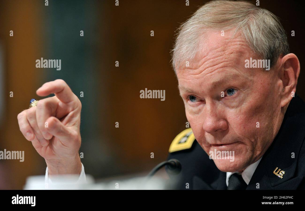 Chairman of the Joint Chiefs of Staff Gen. Martin E. Dempsey takes questions as he and Secretary of Defense Leon E. Panetta appear before the Senate Budget Committee to testify on the President's FY 2013 budget request on Feb. 28, 2012. Stock Photo