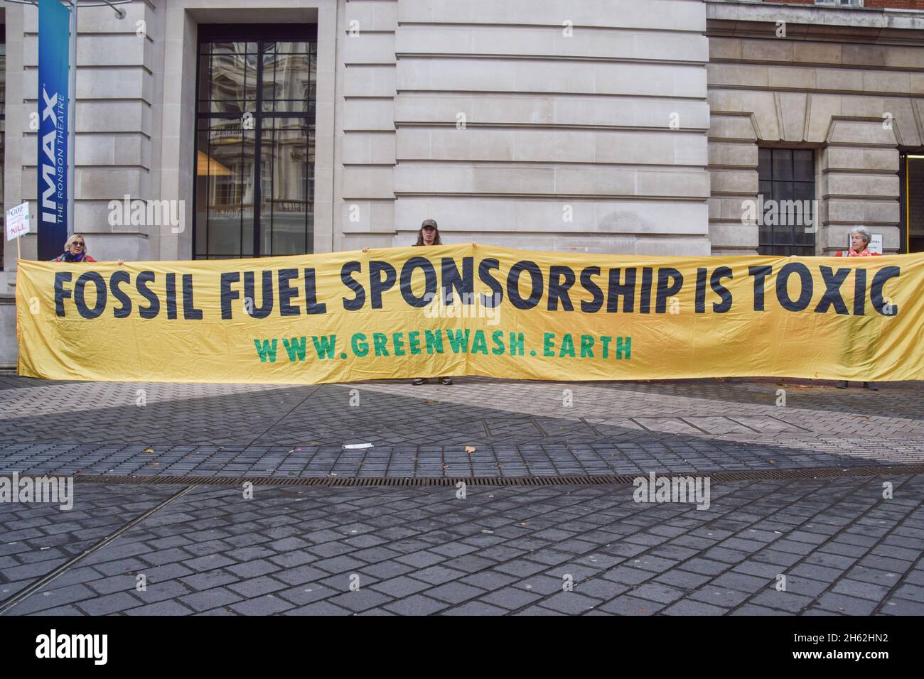 London, UK. 12th Nov, 2021. Protesters hold an anti- fossil fuel banner expressing their opinion during the demonstration.Extinction Rebellion demonstrators gathered outside the Science Museum in South Kensington, as part of their ongoing protests against sponsorship of the museum by fossil fuel companies Shell and Adani. Credit: SOPA Images Limited/Alamy Live News Stock Photo
