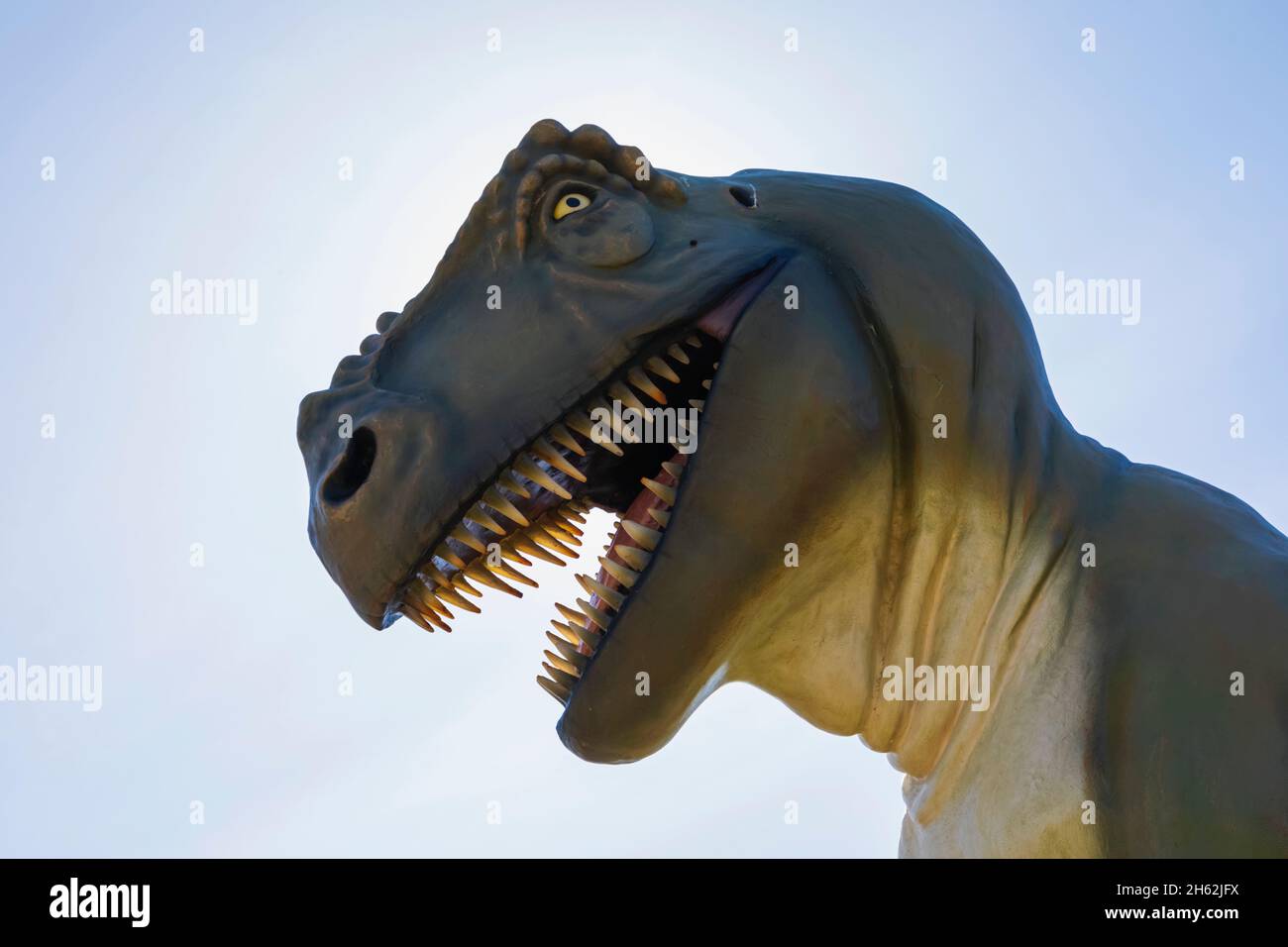 england,isle of wight,the needles landmark attraction,statue of tyrannosaurus-rex head Stock Photo