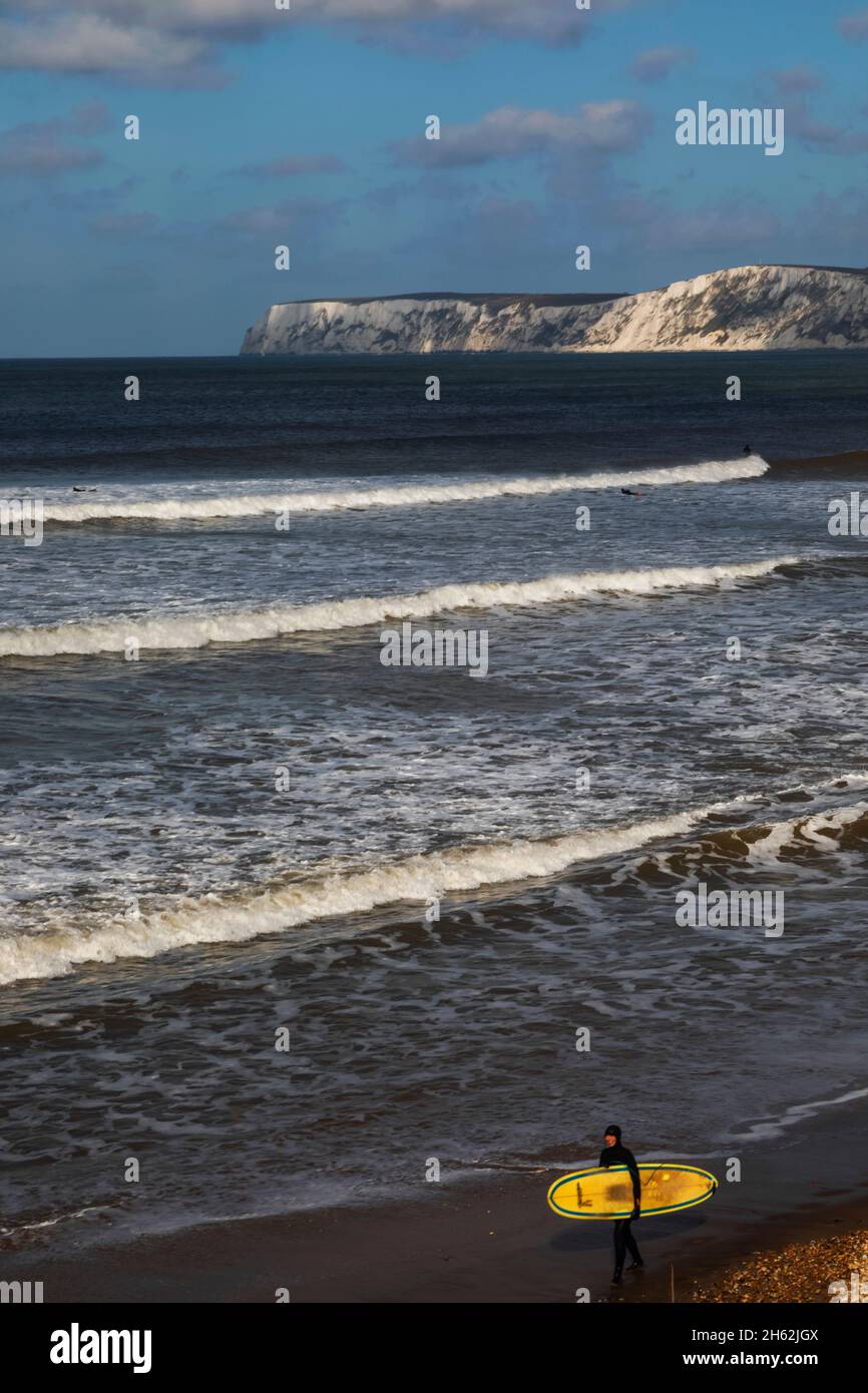 england,isle of wight,coastal view surfers at brightstone bay Stock Photo