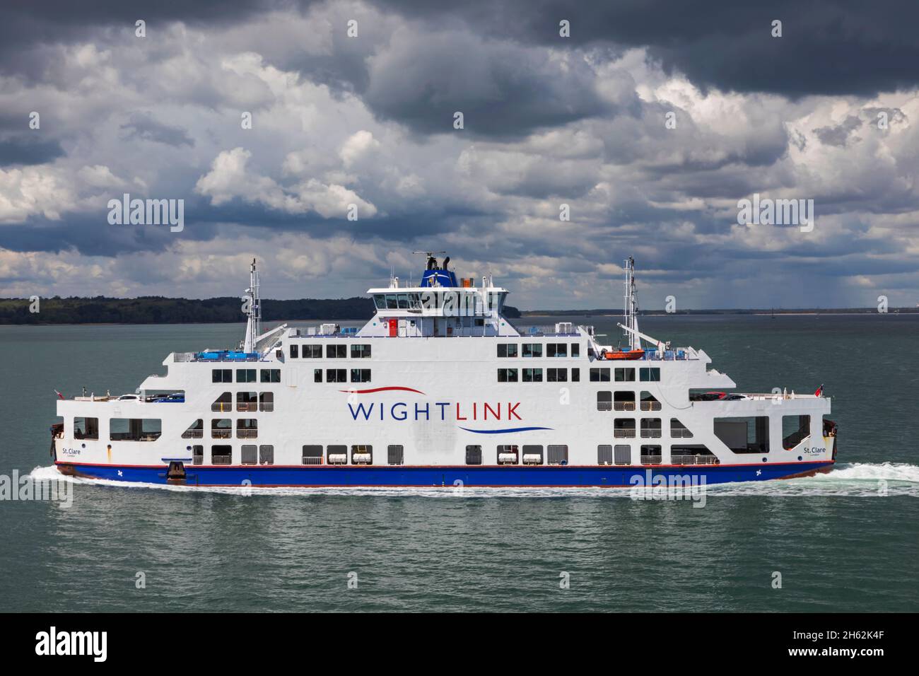 england,isle of wight,yarmouth,the wightlink portsmouth to ryde car and passenger ferry st.clare crossing the solent under cloudy skies Stock Photo