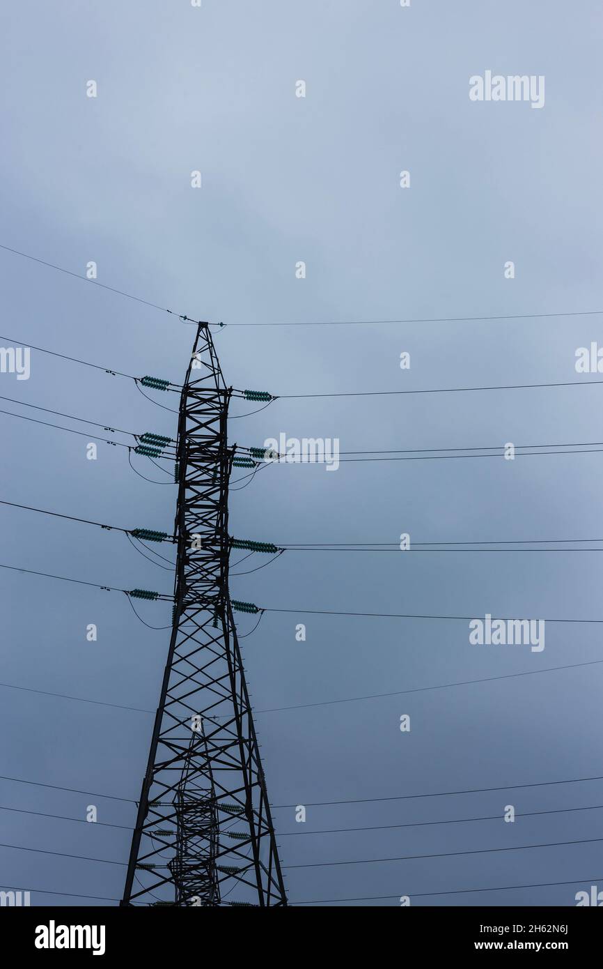 Power lines on the background of the cloudy sky Stock Photo - Alamy