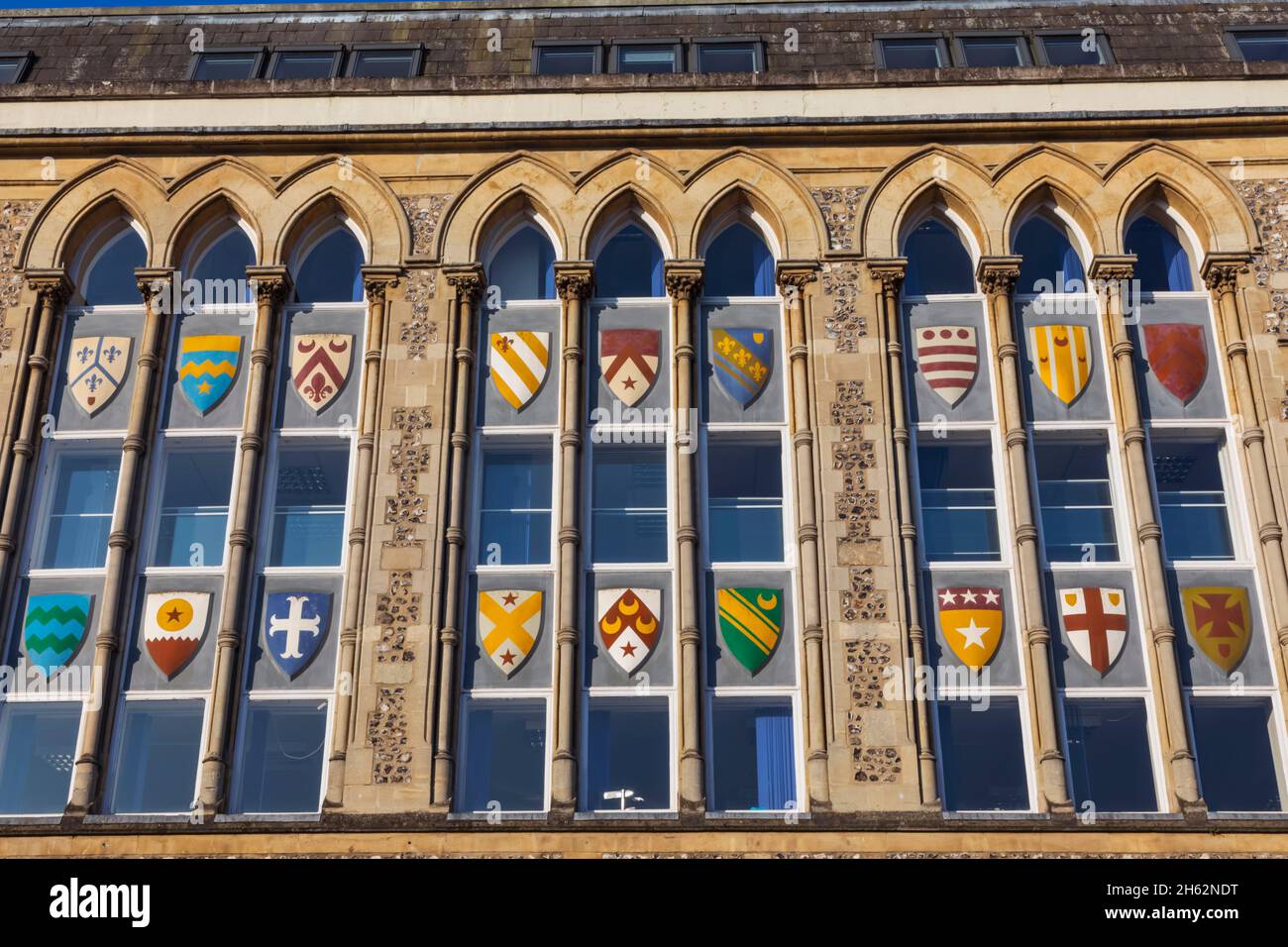 england,hampshire,winchester,the guildhall,window with coats of arms Stock Photo
