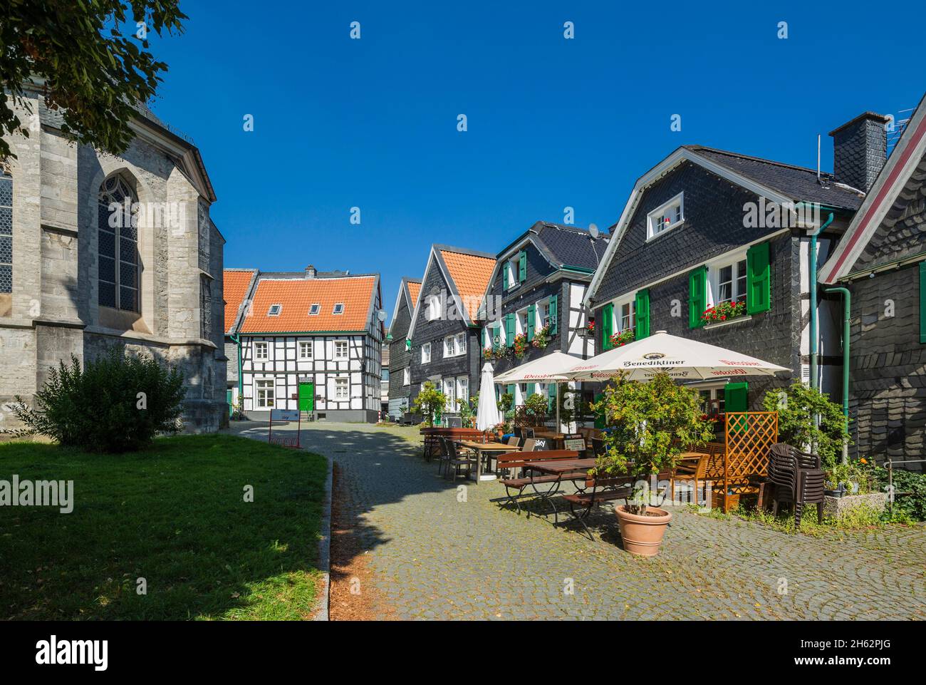 germany,wuelfrath,bergisches land,niederbergisches land,niederberg,rhineland,north rhine-westphalia,old town,residential houses on the church square,half-timbered house,houses with slate cladding,green shutters Stock Photo