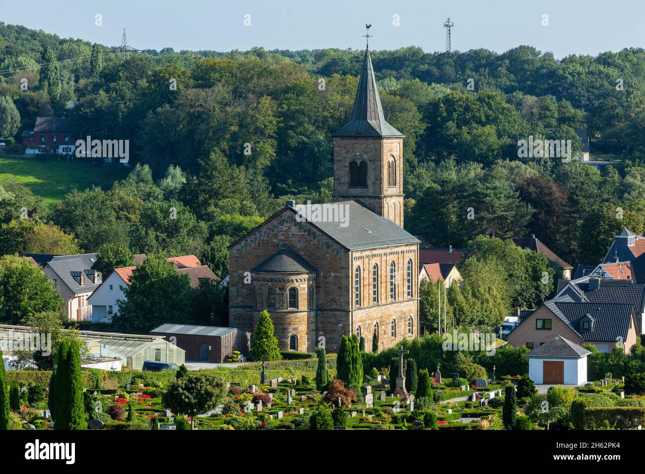 germany,wuelfrath,wuelfrath-duessel,bergisches land,niederbergisches land,niederberg,rhineland,north rhine-westphalia,hill landscape and village duessel,cemetery and protestant church Stock Photo