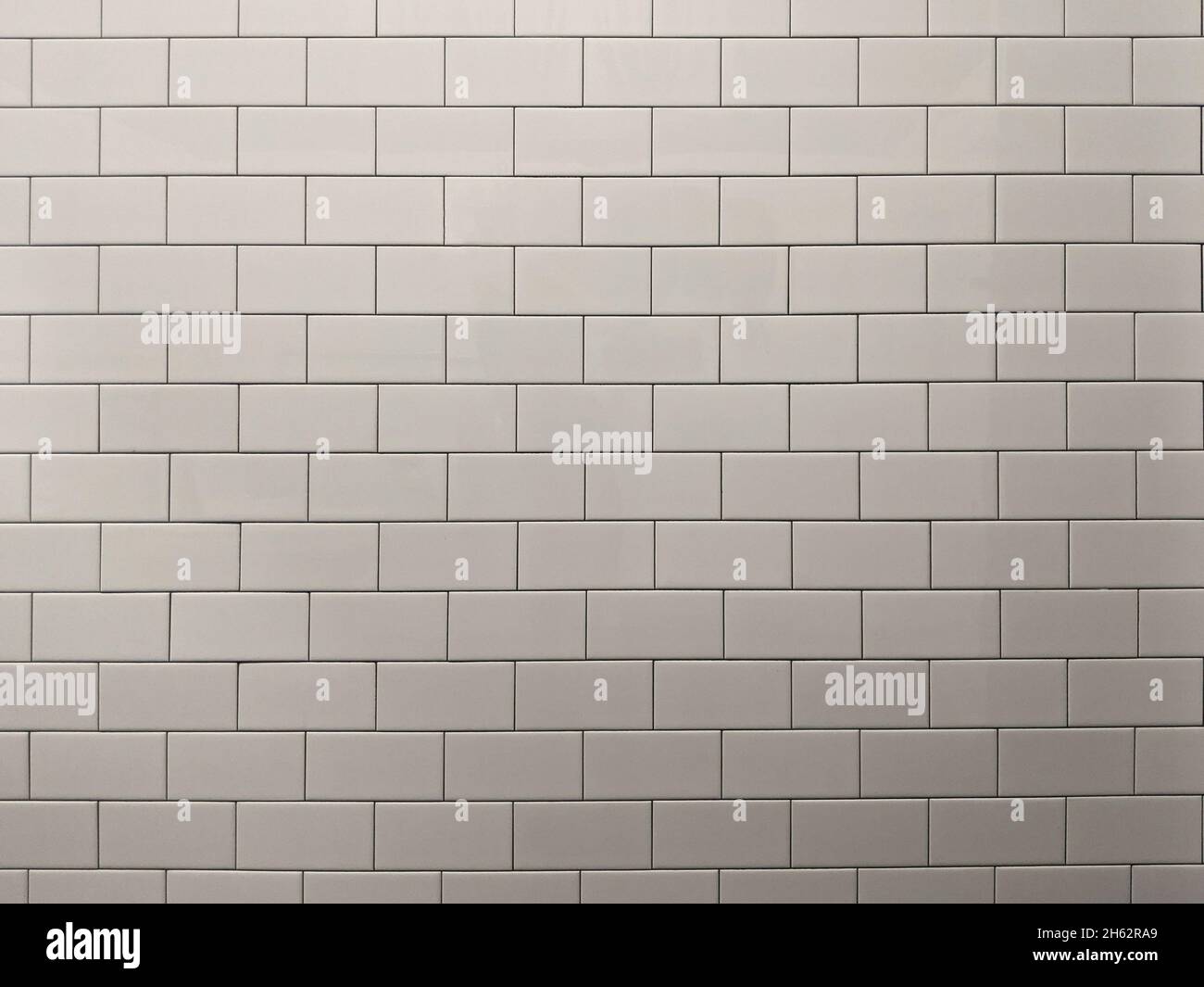 Seamless white bathroom wall tiles. Pattern, brick texture for